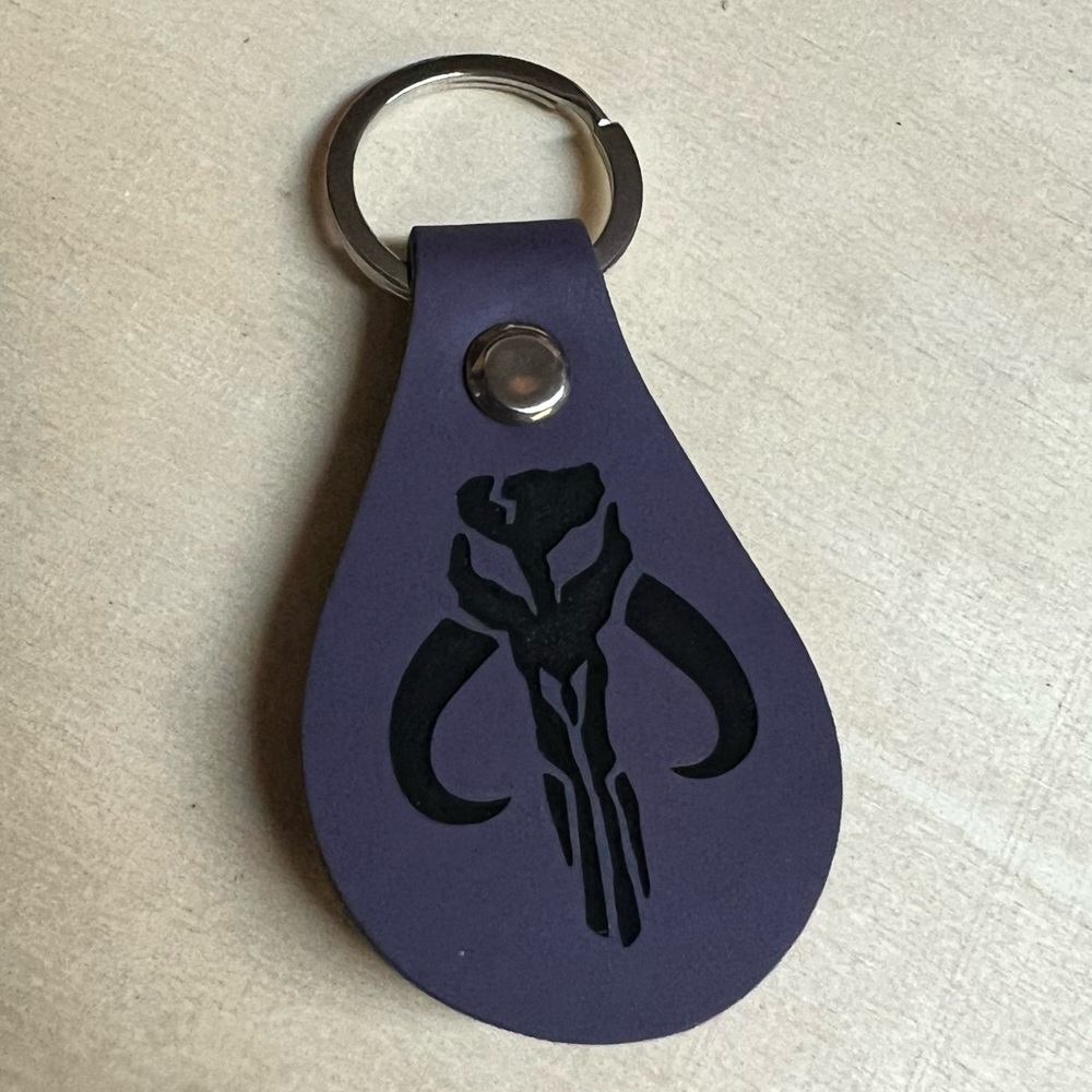 Mythosaur Skull leatherette keychain